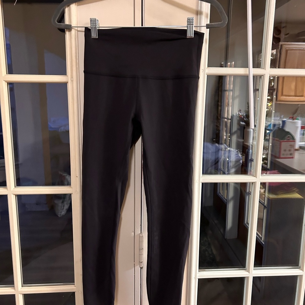 Lululemon Wunder Train 7/8 Tight. Black. Size 6. EUC. $37